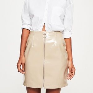 cream high shine faux leather zip thru mini skirt